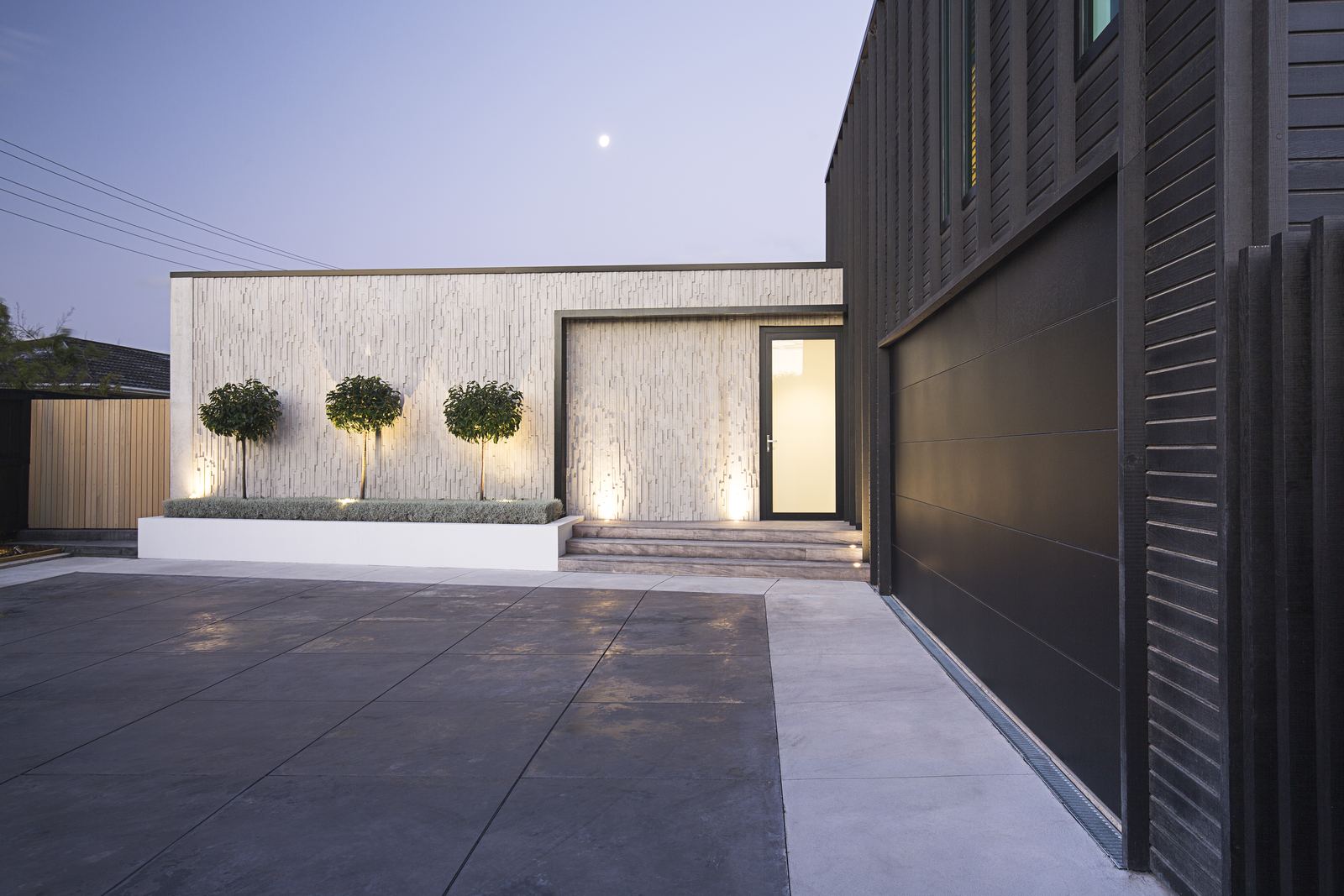 Barrington St House – timber-clad Christchurch home with dramatic street frontage by AW Architects – image 4