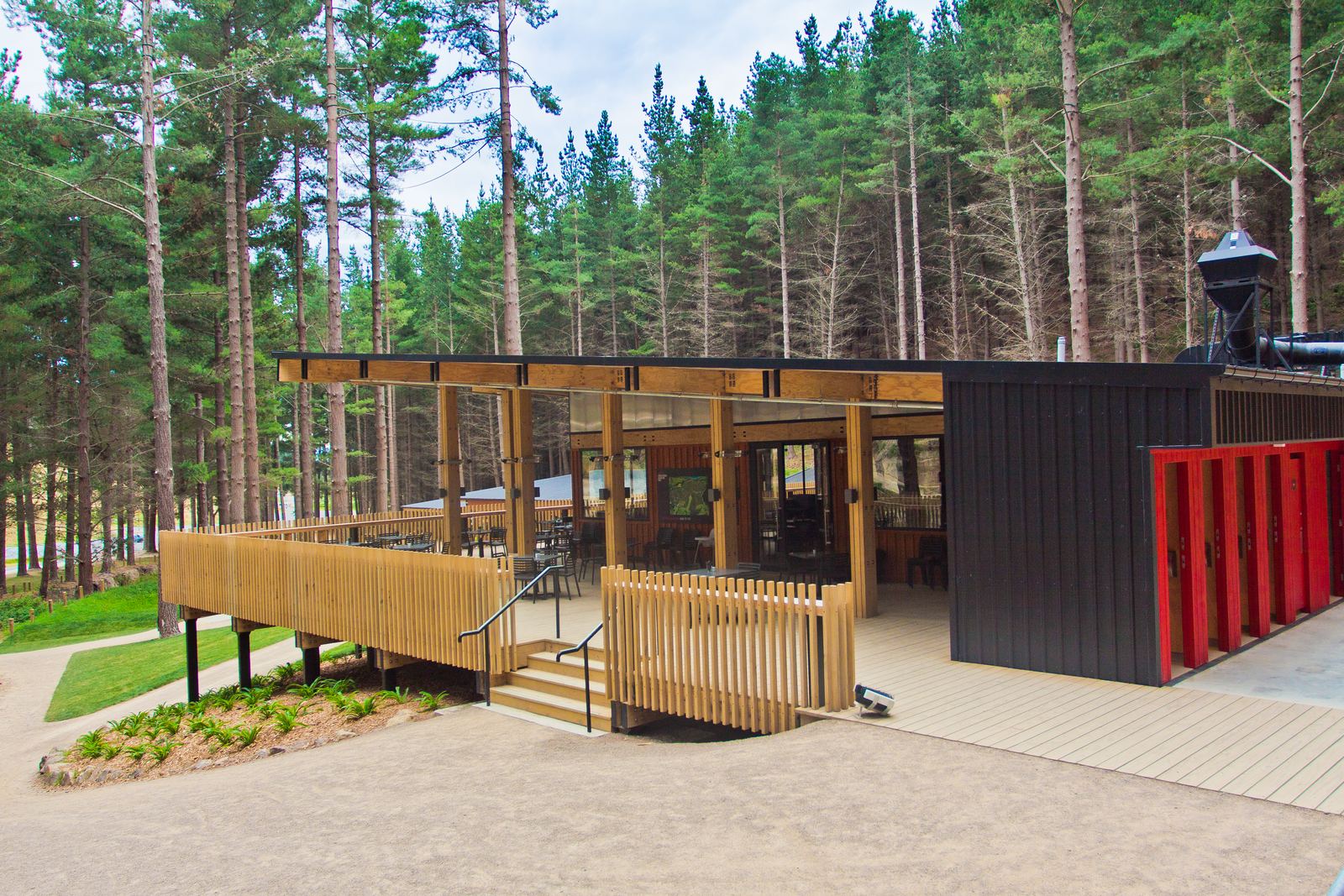 Christchurch Adventure Park – black-clad buildings and folded-roof café in the forest by AW Architects – image 4