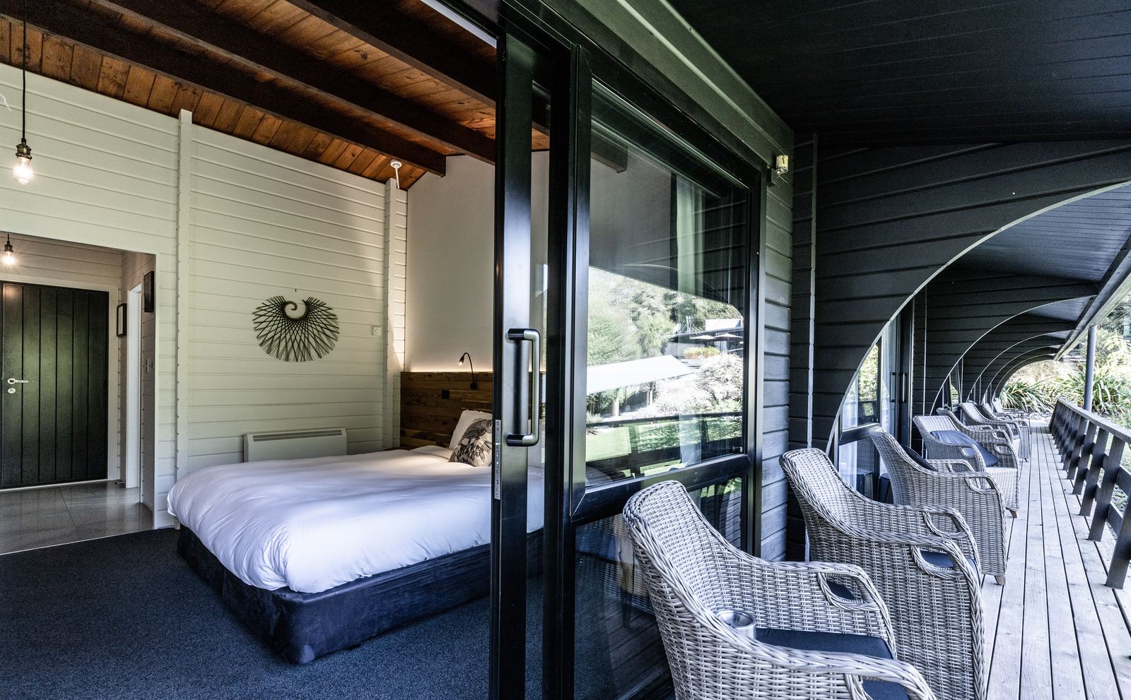 Maruia Hot Springs – alpine resort renovation with timber and stone interiors by AW Architects – image 7