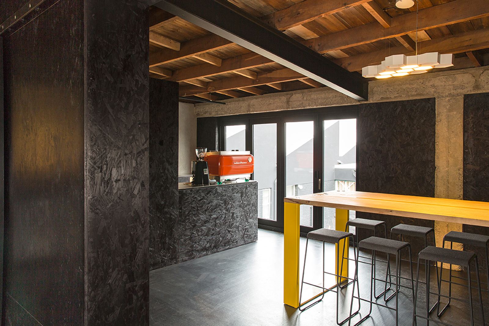 St Asaph Studio – Christchurch shared studio with exposed rimu and bold colour by AW Architects – image 7
