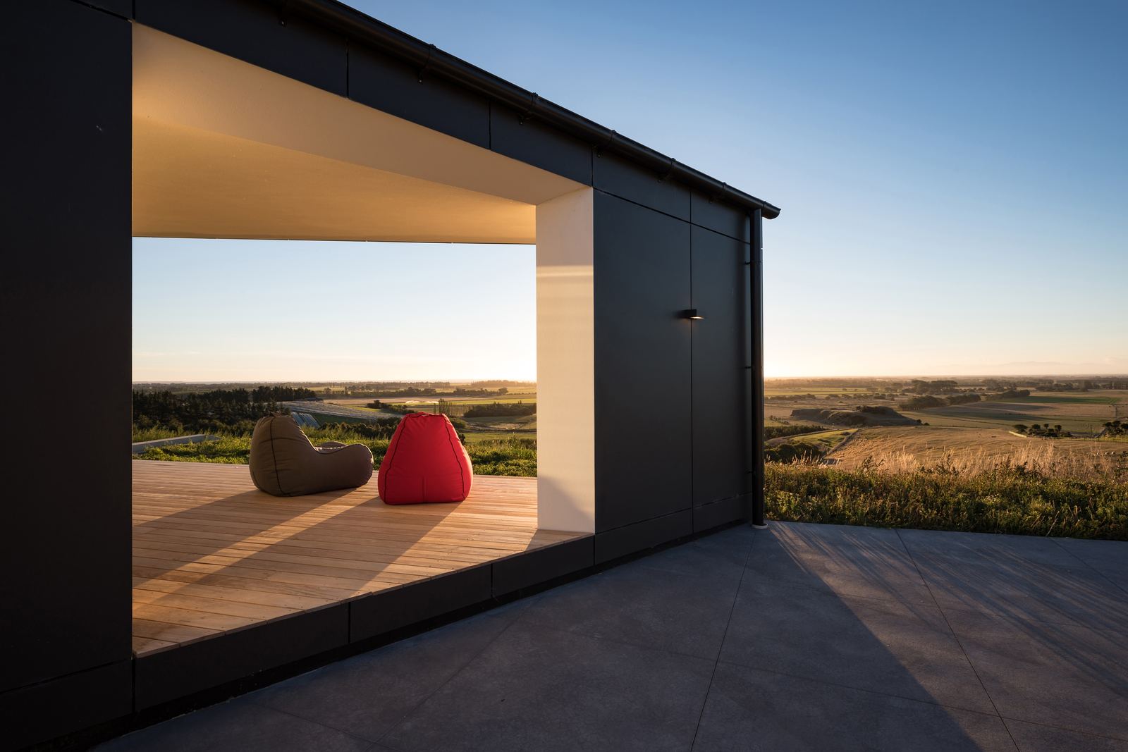 Tai Tapu House – sculptural Port Hills home with black cladding by AW Architects – image 4