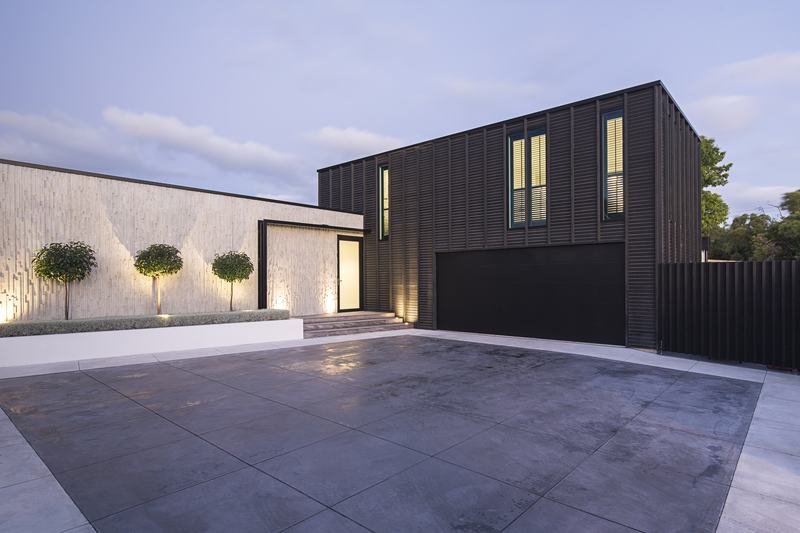 Barrington St House – timber-clad Christchurch home with dramatic street frontage by AW Architects – image 3