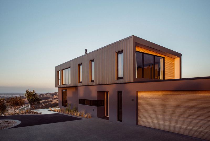 Worsley Spur, Cashmere – Port Hills house with bronze anodised upper level by AW Architects – image 3