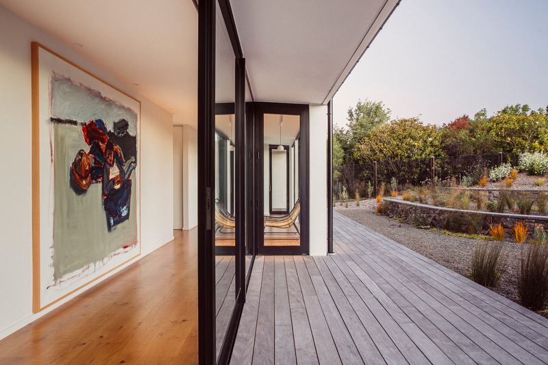 Worsley Spur, Cashmere – Port Hills house with bronze anodised upper level by AW Architects – image 6