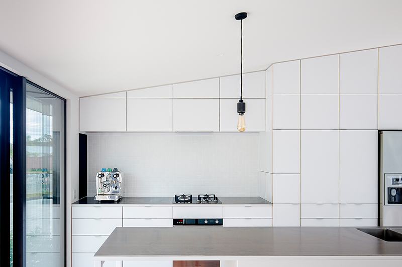 Clark St House, Sumner – rebuild home around a maple courtyard by AW Architects – image 9