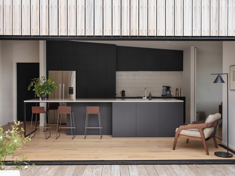 Ocean View Terrace House, Sumner – prefabricated family home with oak interiors and valley views by AW Architects – image 5