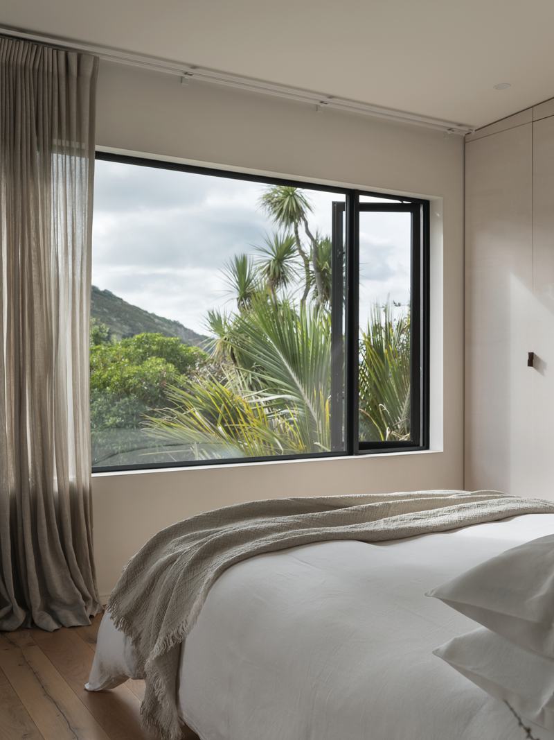 Ocean View Terrace House, Sumner – prefabricated family home with oak interiors and valley views by AW Architects – image 9