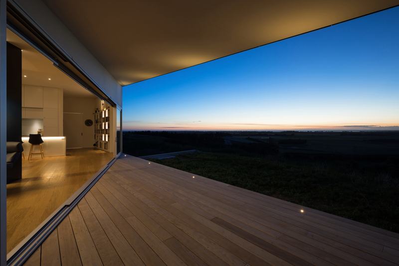 Tai Tapu House – sculptural Port Hills home with black cladding by AW Architects – image 6