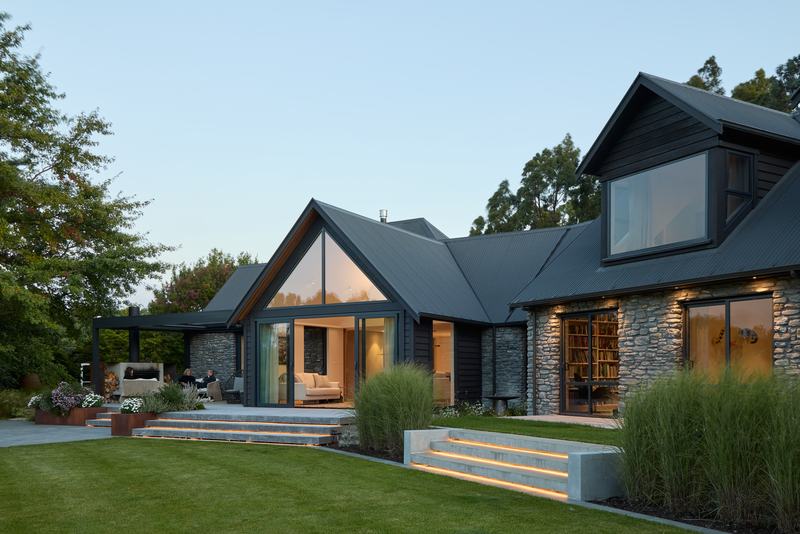 Tai Tapu lakeside home alteration with oak, cedar and clay plaster interiors by AW Architects – image 2
