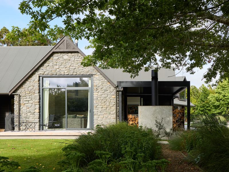 Tai Tapu lakeside home alteration with oak, cedar and clay plaster interiors by AW Architects – image 3